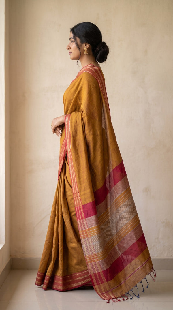 Rust Maheshwari Silk Saree with Chameli Border